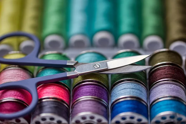 sewing kit, thread, scissors, sewing tools, sewing accessories, colorful, yarn, needlework, handicraft, closeup, thread, thread, thread, scissors, scissors, scissors, scissors, sewing tools, yarn, yarn, yarn, yarn, yarn, handicraft. First clothing repair kit contents: what belongs, and what does not