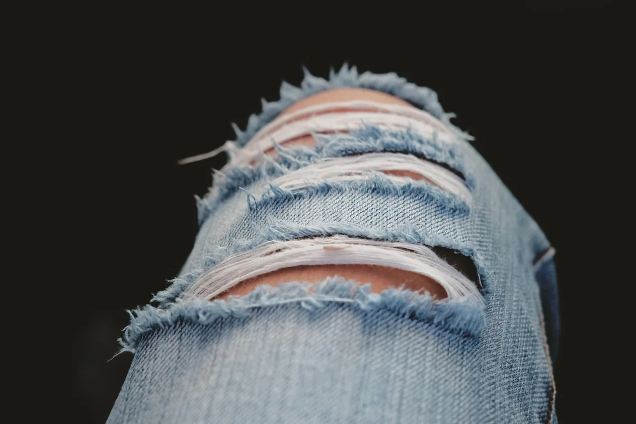 ripped, jeans, ripped jeans, pants, denim, blue, clothing, nature, woman, style, casual, fashion, young, lifestyle, girl, stylish, female, model, modern, urban, design, clothes, cloth, trendy, fashionable, look, outfit, wear, hipster, vogue, summer, teenager, street, people, spring, attractive. Denim repair methods by location: crotch, knee, hem, pocket