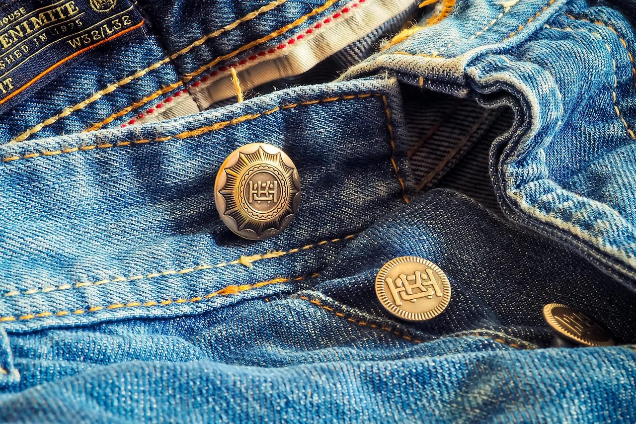 jeans, trousers, trouser buttons, clothing, blue jeans, blue, fashion, detail shot, textiles, seam, washed out, close up, buttons, style, material, natural substance, denim, work pants, jeans, jeans, jeans, jeans, jeans, clothing, denim. Reading denim repair mistakes people make at home with a sceptical eye
