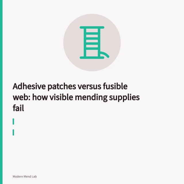 Iron-on adhesive patch lifting at one corner, leaving sticky residue on fabric. Adhesive patches versus fusible web: how visible mending supplies fail